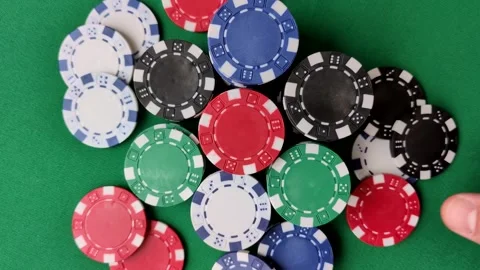 Multicolored casino chips as a conceptual backdrop for gambling games. Multicolo Stock Footage 332267784