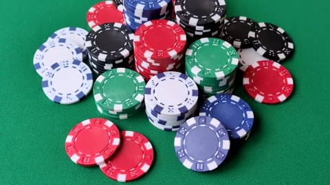 Multicolored casino chips as a conceptual backdrop for gambling games. Multicolo Stock Footage 332267807