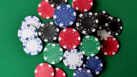 Multicolored casino chips as a conceptual backdrop for gambling games. Multicolo Stock Footage 332267825