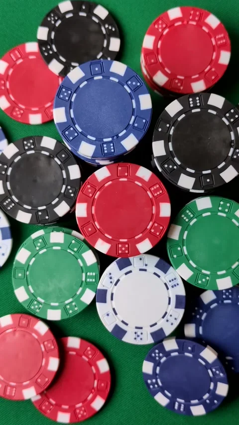 Multicolored casino chips as a conceptual backdrop for gambling games. Multicolo Stock Footage 332267883