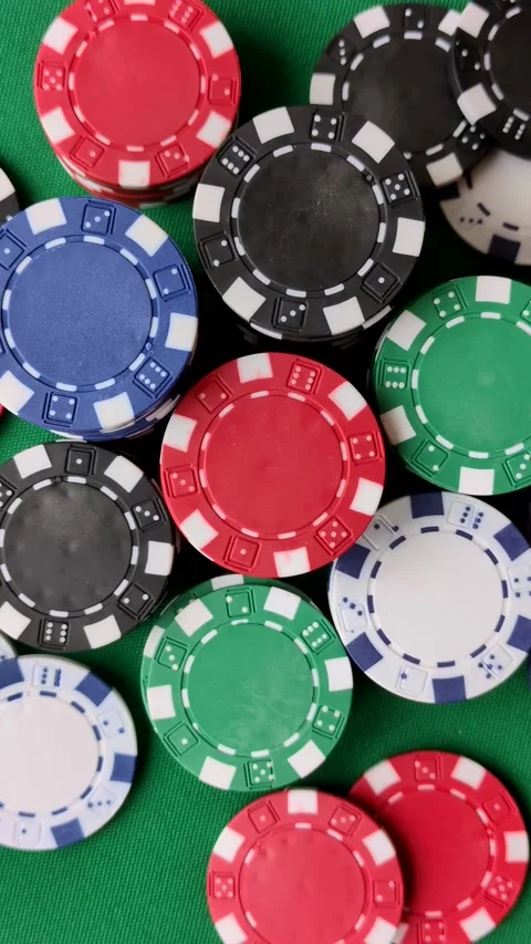 Multicolored casino chips as a conceptual backdrop for gambling games. Multicolo Stock Footage 332267887