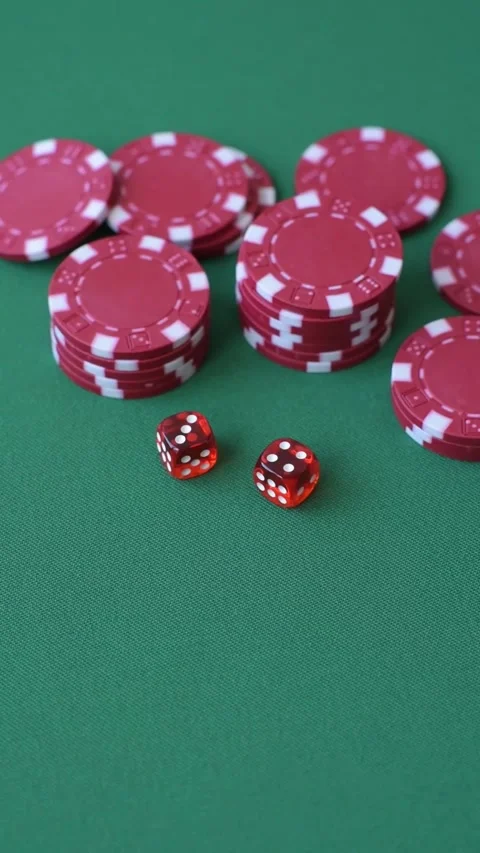 Multicolored casino chips as a conceptual backdrop for gambling games like poker Stock Footage 346773107