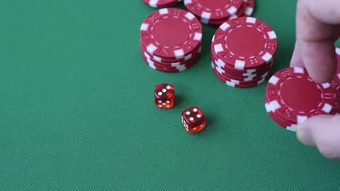 Multicolored casino chips as a conceptual backdrop for gambling games like poker Stock Footage 346773112