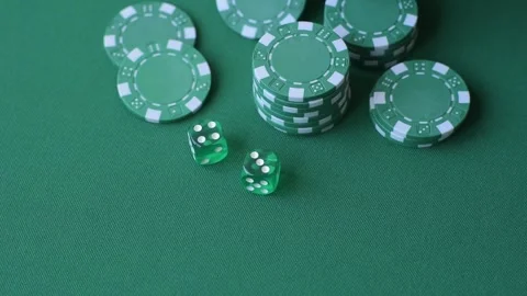 Multicolored casino chips as a conceptual backdrop for gambling games like poker Stock Footage 346773116