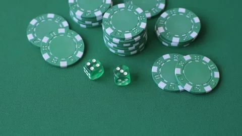 Multicolored casino chips as a conceptual backdrop for gambling games like poker Stock Footage 346773118