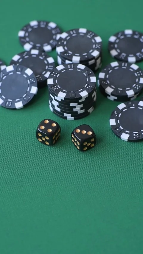 Multicolored casino chips as a conceptual backdrop for gambling games like poker Stock Footage 346773121