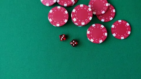 Multicolored casino chips as a conceptual backdrop for gambling games like poker Stock Footage 346773141