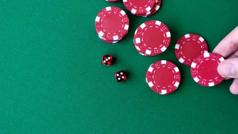 Multicolored casino chips as a conceptual backdrop for gambling games like poker Stock Footage 346773144
