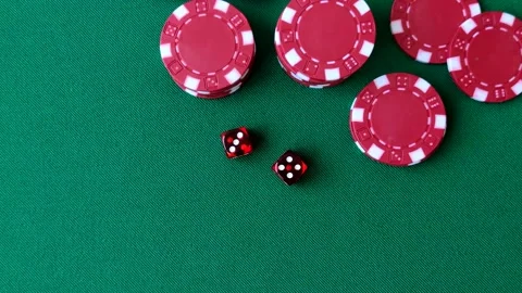 Multicolored casino chips as a conceptual backdrop for gambling games like poker Stock Footage 346773148