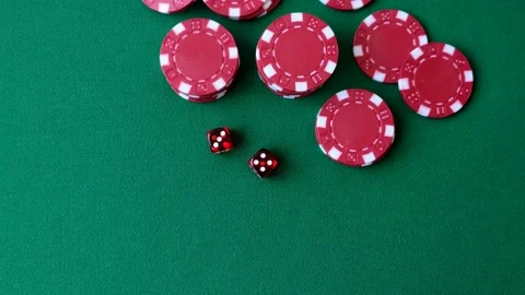 Multicolored casino chips as a conceptual backdrop for gambling games like poker Stock Footage 346773150