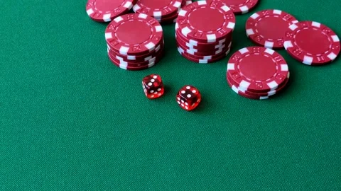 Multicolored casino chips as a conceptual backdrop for gambling games like poker Stock Footage 346773151