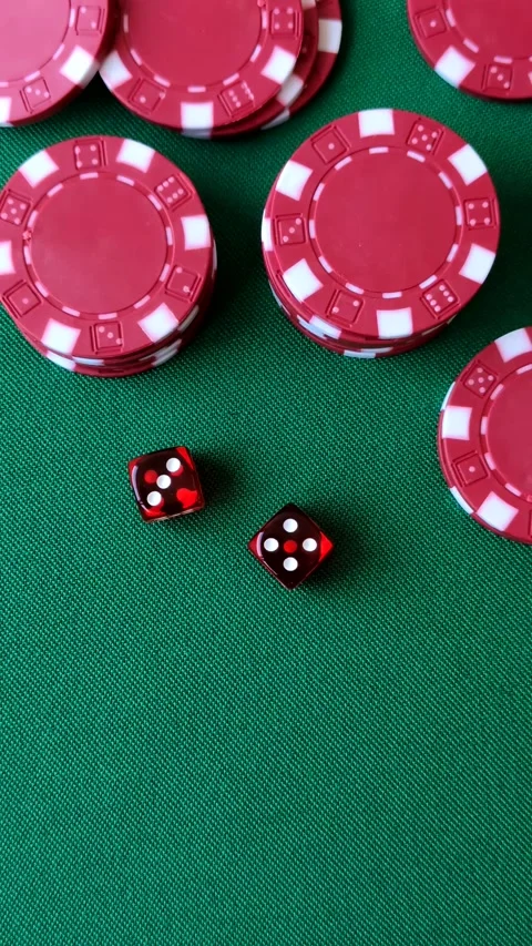 Multicolored casino chips as a conceptual backdrop for gambling games like poker Stock Footage 346773152