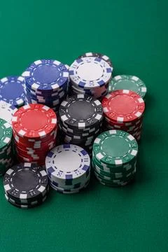 Multicolored casino chips as a conceptual backdrop for gambling games. Mult.. Stock Photos