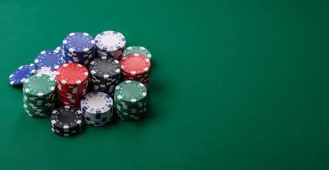 Multicolored casino chips as a conceptual backdrop for gambling games. Mult.. Stock Photos