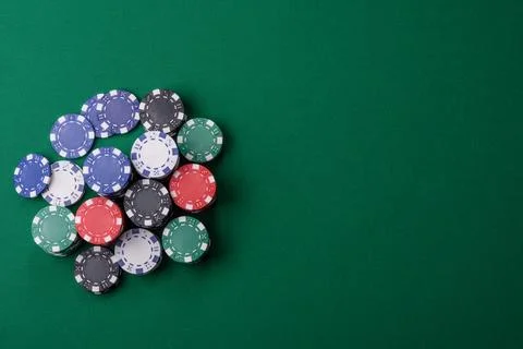 Multicolored casino chips as a conceptual backdrop for gambling games. Mult.. Stock Photos