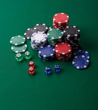 Multicolored casino chips as a conceptual backdrop for gambling games. Mult.. Stock Photos