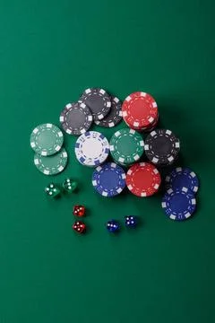 Multicolored casino chips as a conceptual backdrop for gambling games. Mult.. Stock Photos