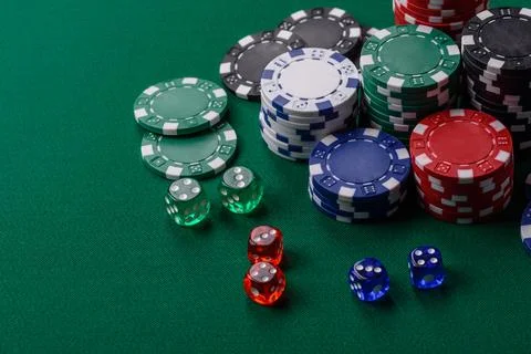 Multicolored casino chips as a conceptual backdrop for gambling games. Mult.. Stock Photos