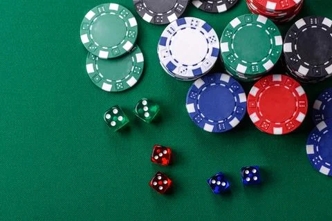 Multicolored casino chips as a conceptual backdrop for gambling games. Mult.. Stock Photos
