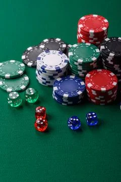 Multicolored casino chips as a conceptual backdrop for gambling games. Mult.. Stock Photos