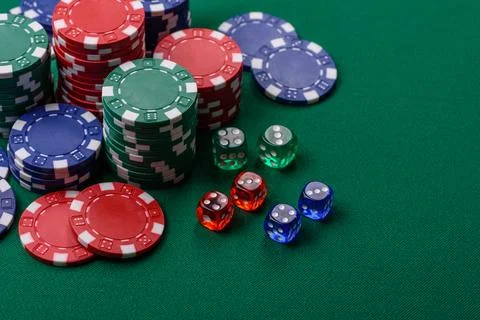 Multicolored casino chips as a conceptual backdrop for gambling games. Mult.. Stock Photos