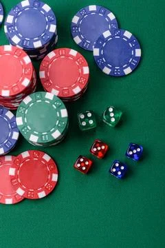 Multicolored casino chips as a conceptual backdrop for gambling games. Mult.. Stock Photos