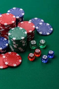Multicolored casino chips as a conceptual backdrop for gambling games. Mult.. Stock Photos