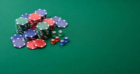 Multicolored casino chips as a conceptual backdrop for gambling games. Mult.. Stock Photos