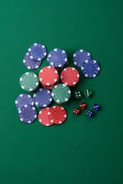 Multicolored casino chips as a conceptual backdrop for gambling games. Mult.. Stock Photos