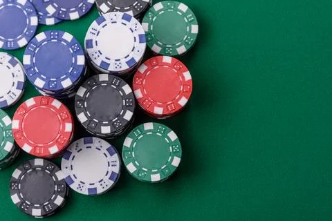 Multicolored casino chips as a conceptual backdrop for gambling games. Mult.. Stock Photos