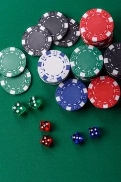 Multicolored casino chips as a conceptual backdrop for gambling games. Mult.. Stock Photos