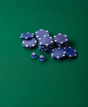 Multicolored casino chips as a conceptual backdrop for gambling games like .. Stock Photos