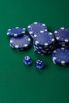 Multicolored casino chips as a conceptual backdrop for gambling games like .. Stock Photos