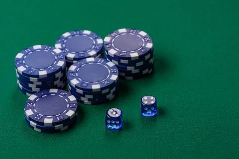 Multicolored casino chips as a conceptual backdrop for gambling games like .. Stock Photos
