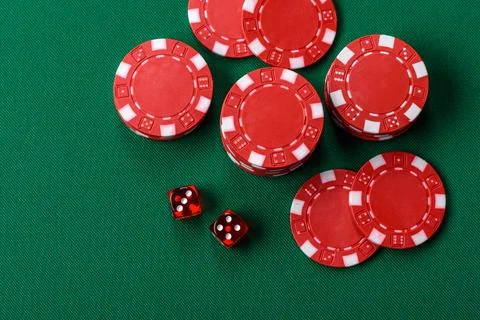 Multicolored casino chips as a conceptual backdrop for gambling games like .. Stock Photos