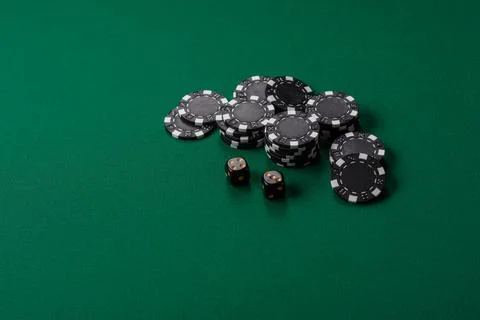 Multicolored casino chips as a conceptual backdrop for gambling games like .. Stock Photos