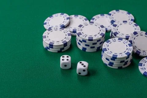 Multicolored casino chips as a conceptual backdrop for gambling games like .. Stock Photos