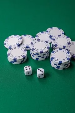 Multicolored casino chips as a conceptual backdrop for gambling games like .. Stock Photos