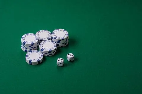 Multicolored casino chips as a conceptual backdrop for gambling games like .. Stock Photos