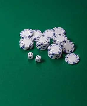 Multicolored casino chips as a conceptual backdrop for gambling games like .. Stock Photos