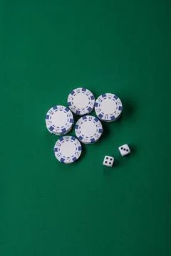 Multicolored casino chips as a conceptual backdrop for gambling games like .. Stock Photos