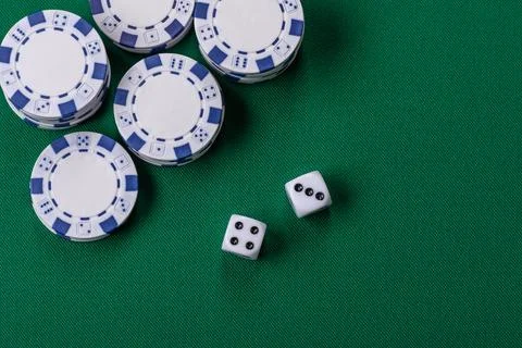 Multicolored casino chips as a conceptual backdrop for gambling games like .. Stock Photos