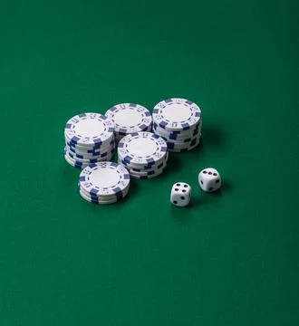 Multicolored casino chips as a conceptual backdrop for gambling games like .. Stock Photos