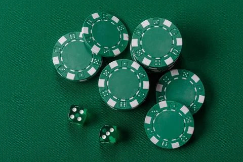 Multicolored casino chips as a conceptual backdrop for gambling games like .. Stock Photos