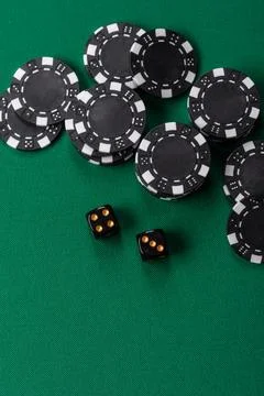 Multicolored casino chips as a conceptual backdrop for gambling games like .. Stock Photos