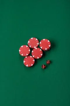 Multicolored casino chips as a conceptual backdrop for gambling games like .. Stock Photos