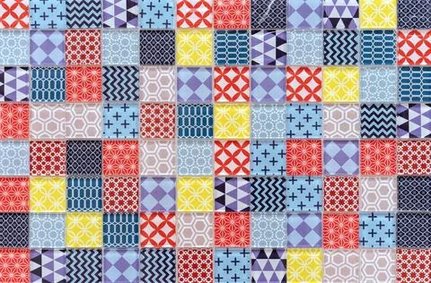 Multicolored ceramic mosaic tiles in patchwork style. Stock Photos