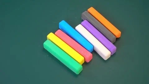 Multicolored chalks on green chalkboard background, back to school concept,.. Stock Footage 330986232