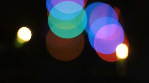 Multicolored Christmas lights in a disco. Multi-colored flashlights flash. Red Stock Footage 73711482