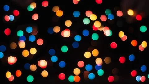 Multicolored circles on a black background abstract pattern Fotos de archivo